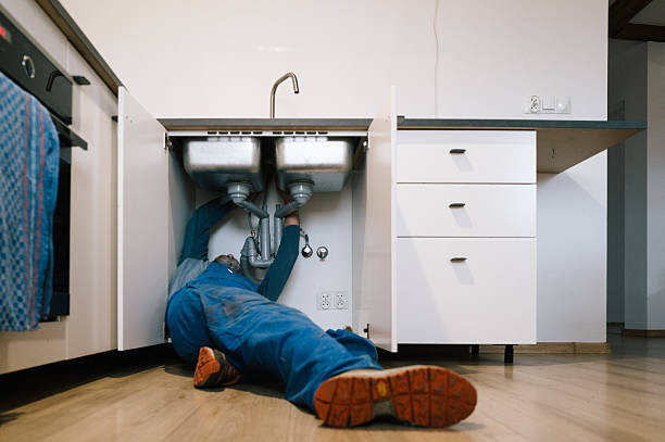 Professional Plumber technician working in Township Of Washington, NJ